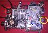 240D IP Elements-fuel-injection-pump-side-view-showing-number-plate-mar-14.jpg