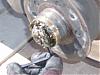 How To Replace Front Rotor W123-2loosen-nut.jpg