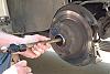 W123 A How to, replacing rear axles.-8-drive-out-axel-brass-drift.jpg