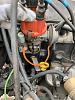 Smoke from engine bay under exhaust manifold after a month parked-c3d85b05-d359-4000-8037-6f08bb3d9a49.jpeg